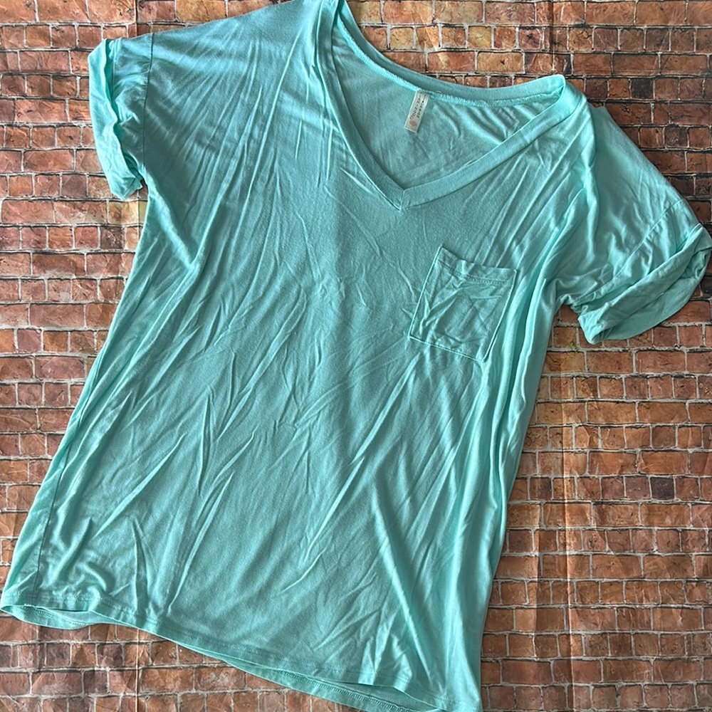 *5 for $20* Women's Aqua V-Neck Top
